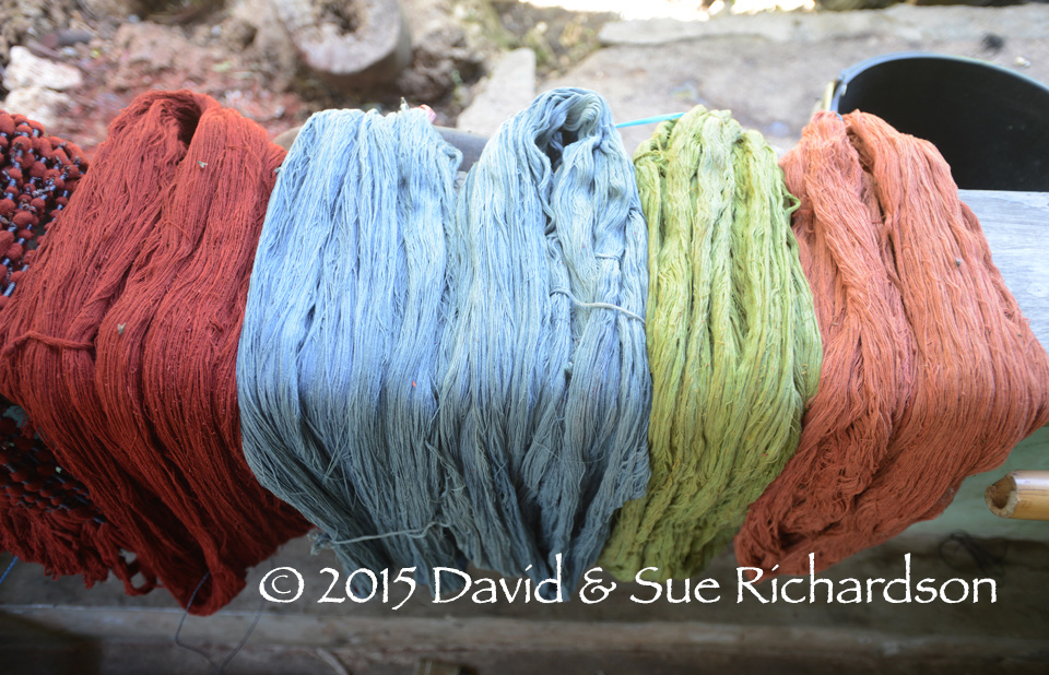 Description: Skeins of cotton lightly dyed with indigo, morinda, and green