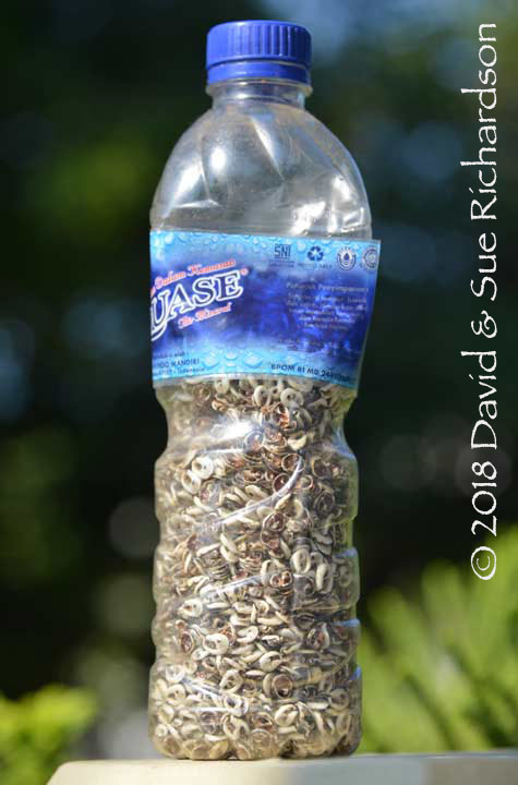 Description: A water bottle full of wuti kau