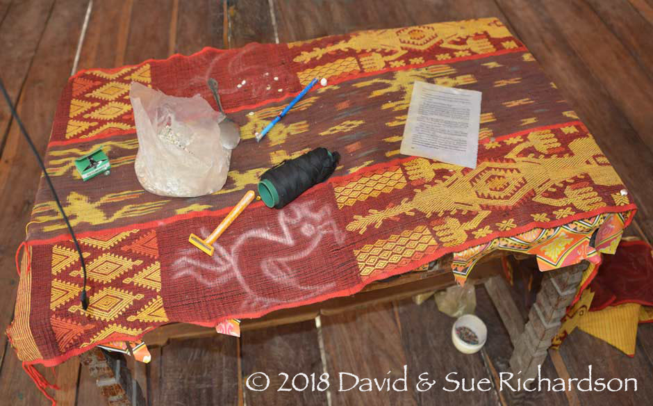 Description: A modern halenda hiamba pahikung pinned to a table before the addition of the wuti kau