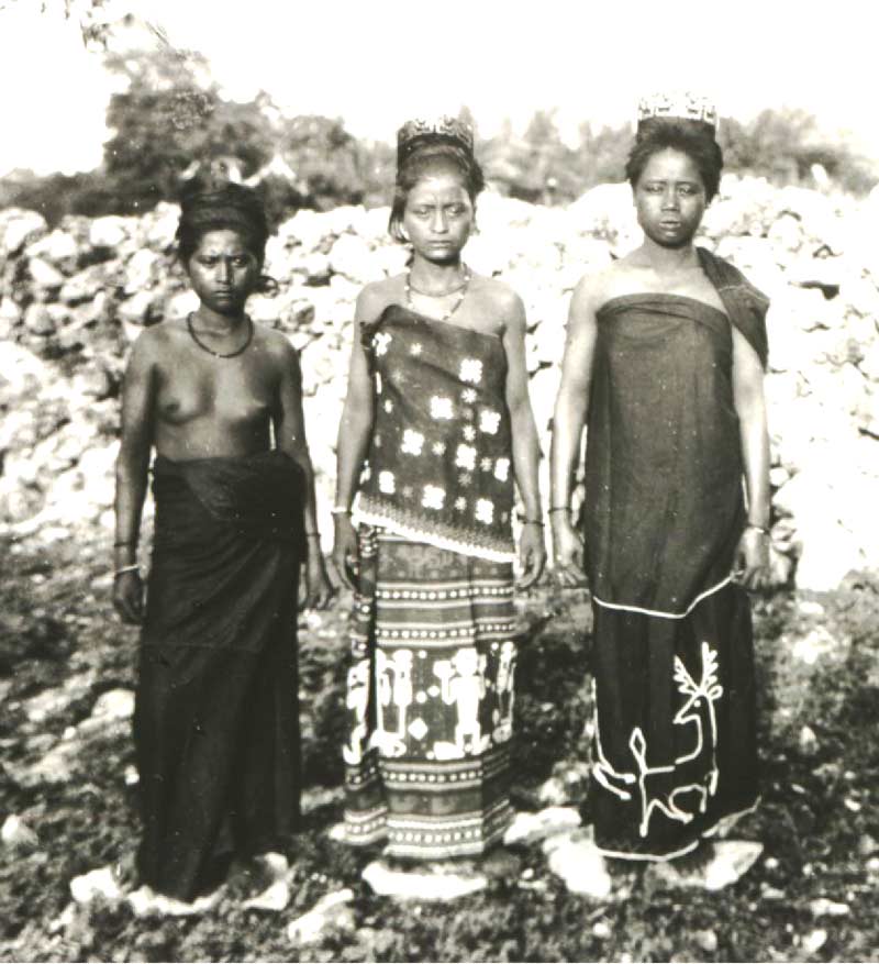 Description: Three women from East Sumba dressed for a funeral feast at Watumbaka