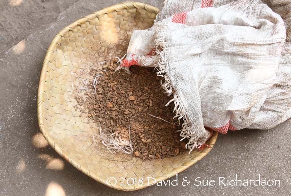 Description: A bag of dry crushed morinda root