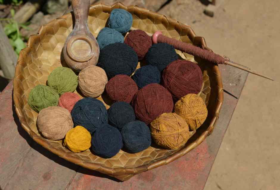 Description: Naturally dyed balls of cotton