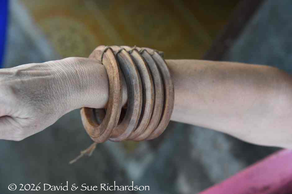 Description: A set of wooden bracelets tied together
